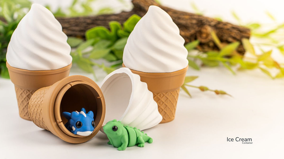 Ice cream cone-shaped toy with a small blue creature inside, set against a natural background.
