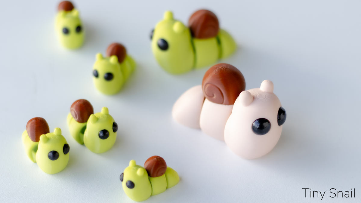 Group of Tiny Snails in yellow and pink