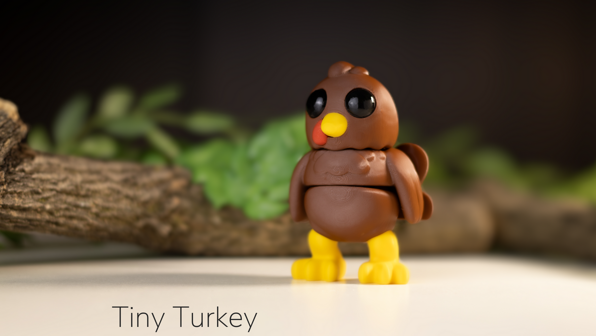 Tiny Turkey standing among leaves and branches