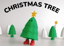 Toy Christmas tree with a star on a white background, labeled 'Christmas Tree'.
