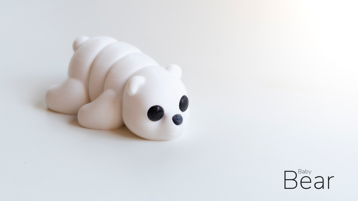 White Polar Bear fidget toy lying down