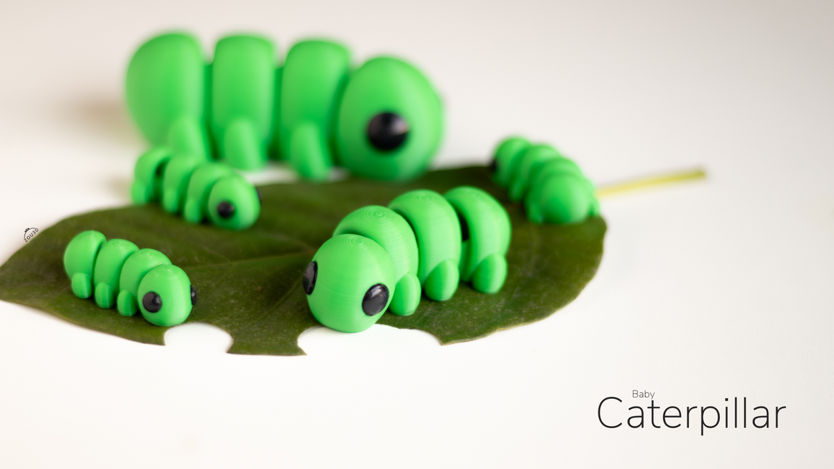 Several green Baby Caterpillars on leaves