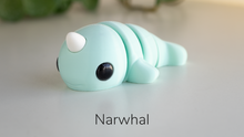 Mint green Baby Narwhal fidget toy