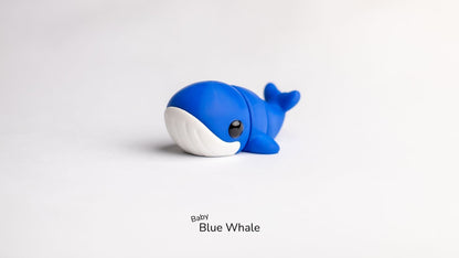 Blue whale toy on a white background with 'Baby Blue Whale' text.