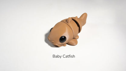 Toy catfish on a white background with 'Baby Catfish' text.