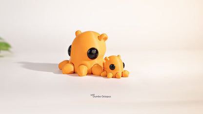 Two orange octopus toys on a light beige background