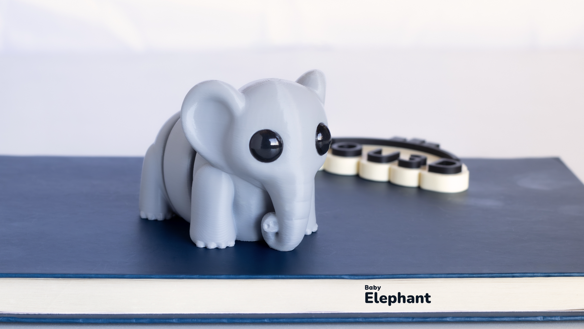 Grey Baby Elephant fidget toy on a table