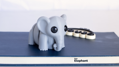 Grey Baby Elephant fidget toy on a table