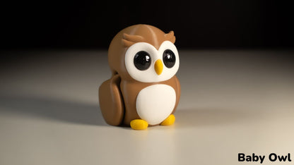 Toy owl figurine on a neutral background with 'Baby Owl' text