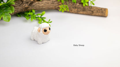 White Baby Sheep fidget toy with branches behind