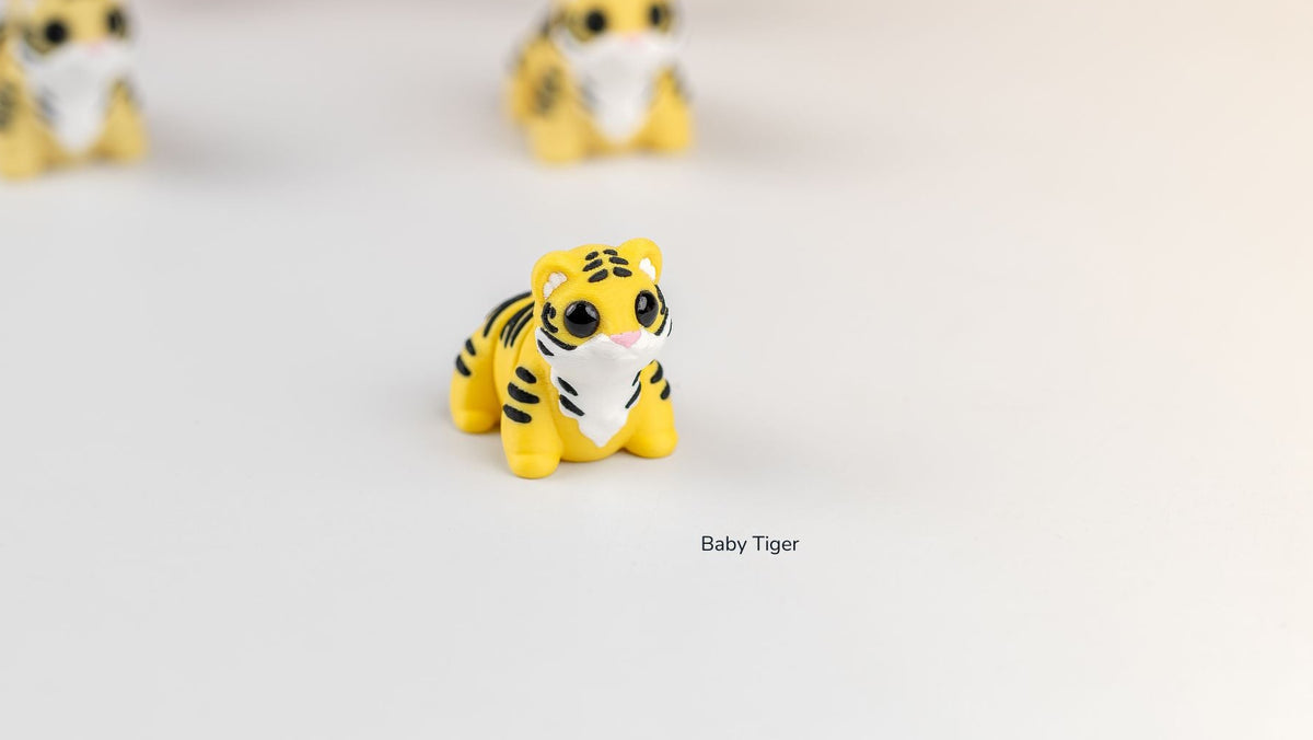 Baby Tigers in yellow and white with black stripes