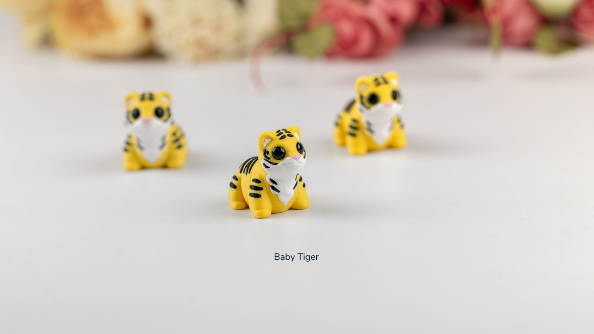 Group of Baby Tigers with flowers behind