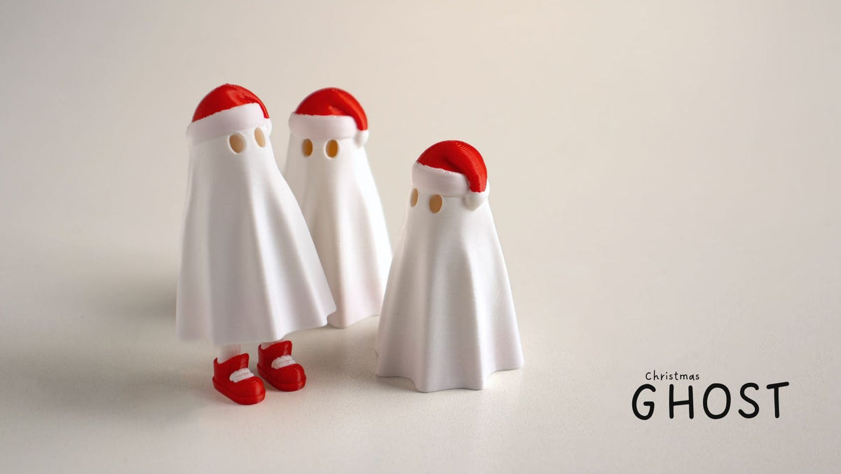 Two white Christmas Ghosts wearing red Santa hats