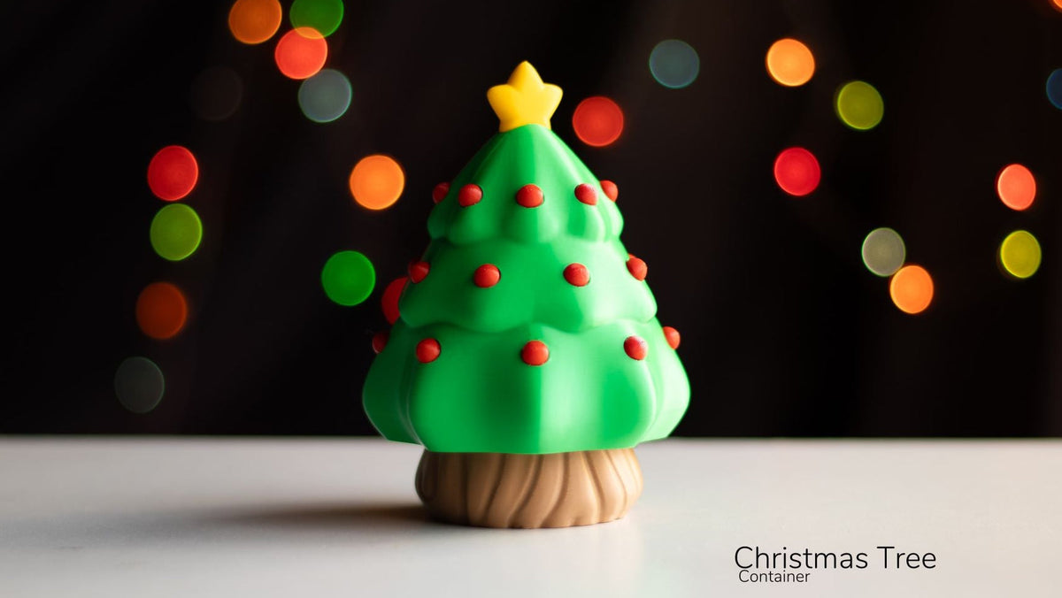 Christmas tree-shaped container with a star on top, set against a dark background with colorful lights.