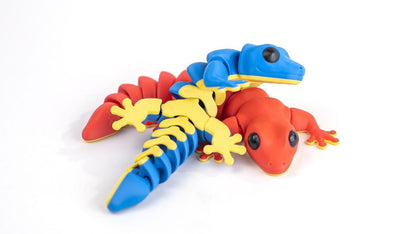 Red Gecko with blue and yellow geckos