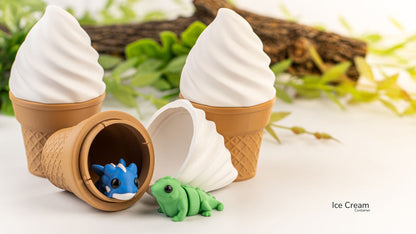 Ice cream cone-shaped toy with a small blue creature inside, set against a natural background.