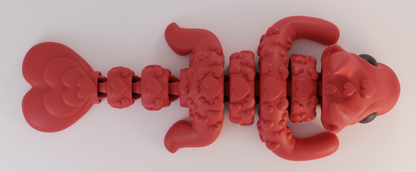 Red dragon-shaped toy on a white background with 'LOVE DRAGON' branding.