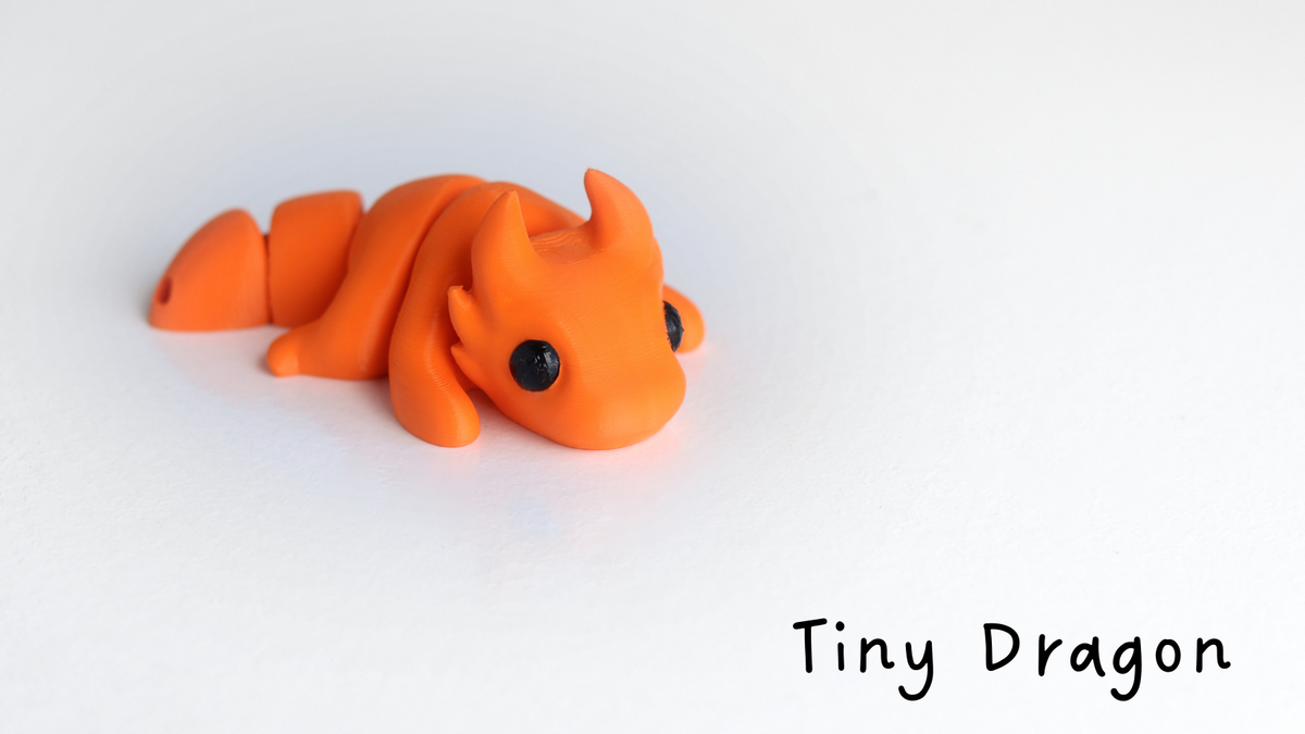 Orange Tiny Baby Dragon lying down