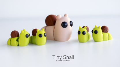 Tiny Snails in pink and green with brown shells