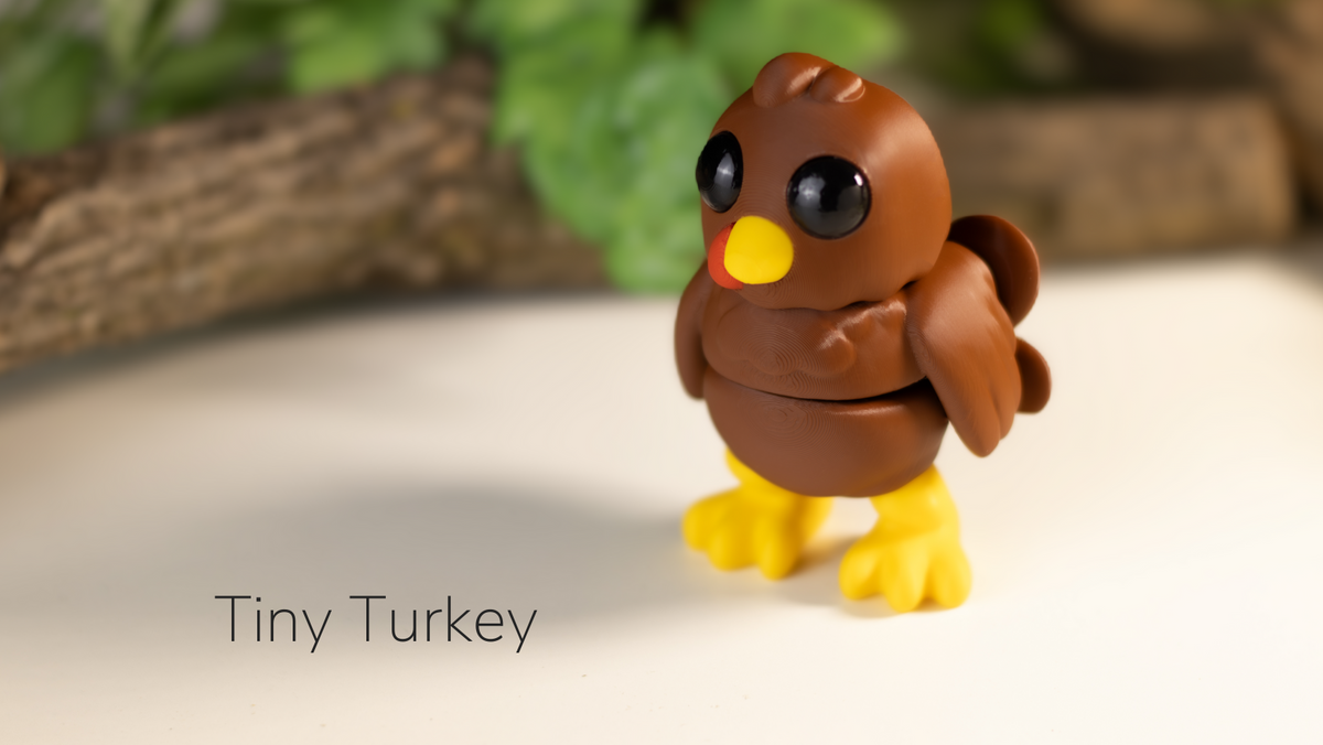 Brown Tiny Turkey with orange feet in front of a log