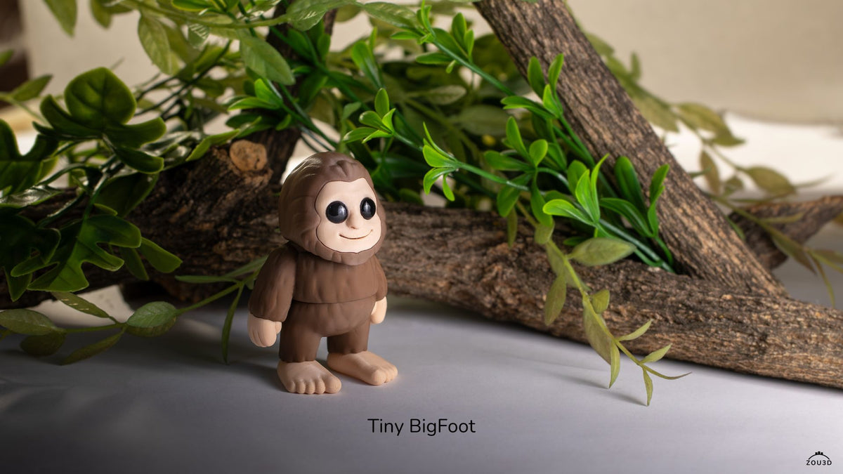 Tiny Bigfoot standing beside a wooden branch
