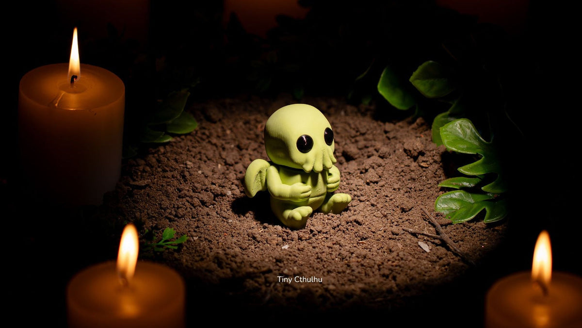 Tiny Cthulhu figure in candlelight