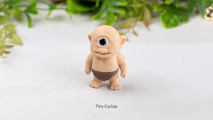 Small Cyclops figure standing among leaves