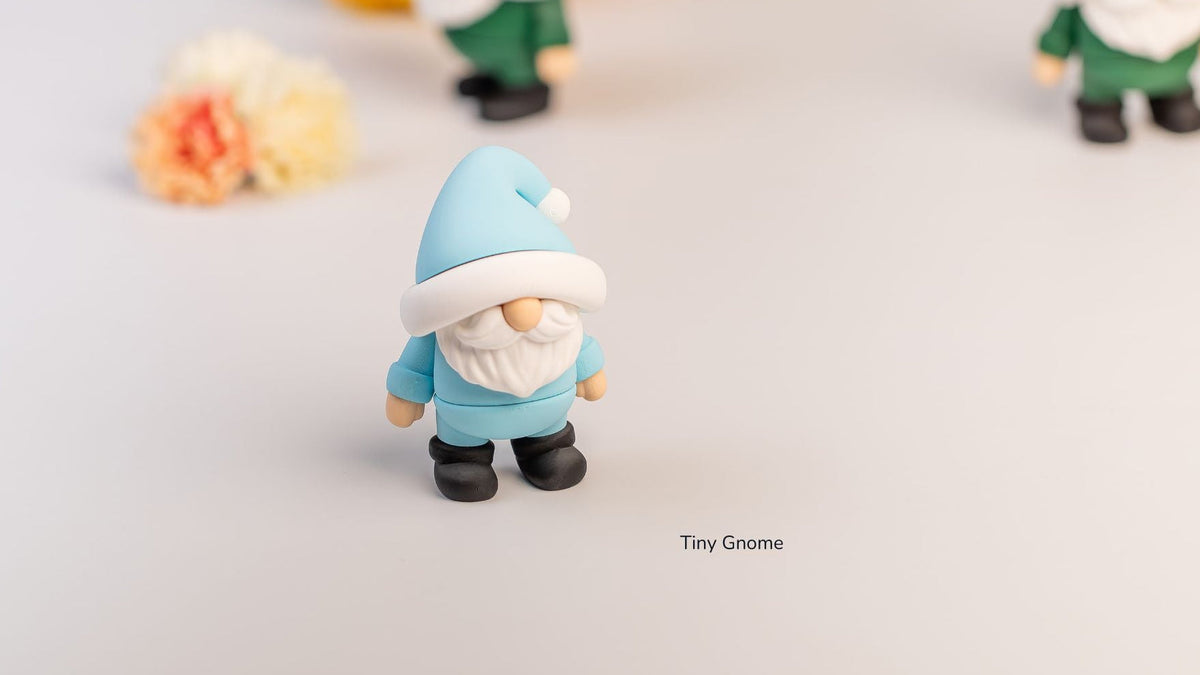 Blue and white Tiny Gnome fidget toy