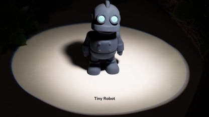 Small robot toy on a dark background with a spotlight