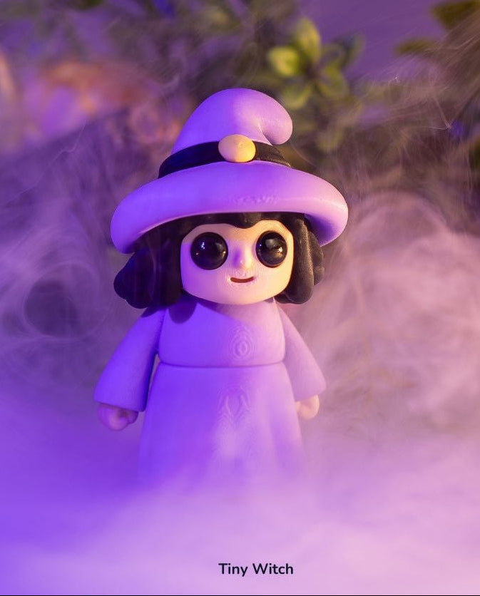 Tiny Witch figure with big eyes in purple mist